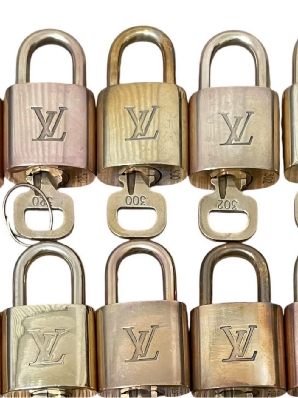 Collectors and restorers****Louis Vuitton Padlock and Key Set